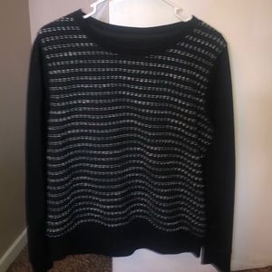 a black sweater with cool pattern